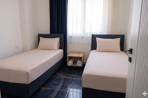 Etlik ucuz pansiyon, iki tek kişilik yataklı oda